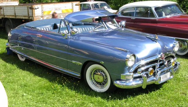 Restored 1951 Convertible Brougham; wire wheels and accessories are individual-car context