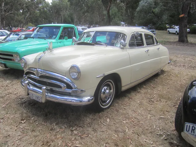 Exact-year 1952 Hudson Hornet view documenting the step-down body, grille, roof, glass, lamps, bumpers, trim, and wheel treatment; condition remains subject-specific.