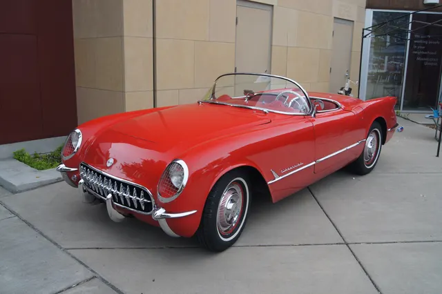 Alternate exact-year view of a Sportsman Red Corvette showing the roadster proportions, side spear, windshield, and rear-fender shape.