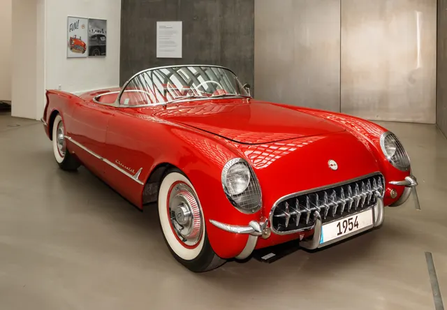 Museum-displayed Sportsman Red 1954 Corvette retained as restoration context; finish and component originality require inspection of the individual car.