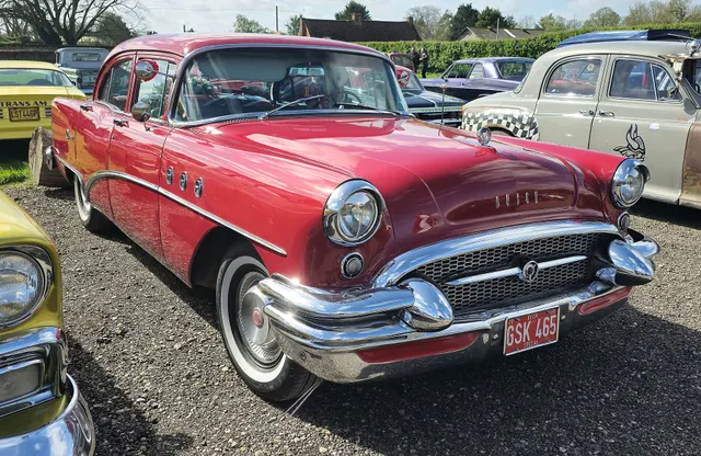 Exact-year stock-presenting view retained for body, trim, glazing, lamp, bumper, and wheel context; restoration details remain specific to the photographed car.