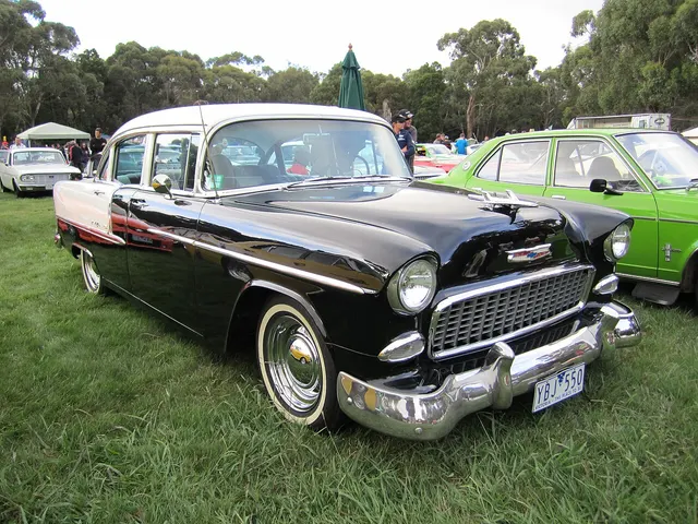 Four-door Bel Air sedan showing the post body, doors, greenhouse, grille, and series brightwork; retained to represent a high-volume family body style.