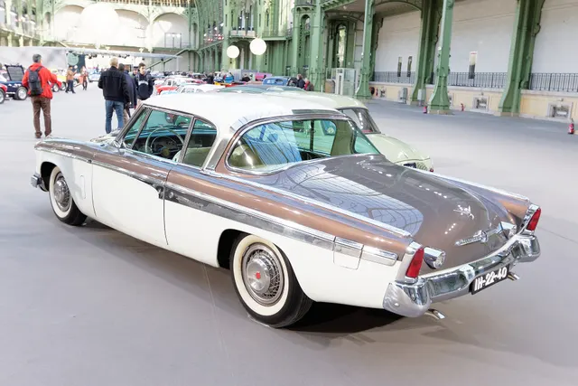 Exact-year stock-presenting view retained for body, trim, glazing, lamp, bumper, and wheel context; restoration details remain specific to the photographed car.