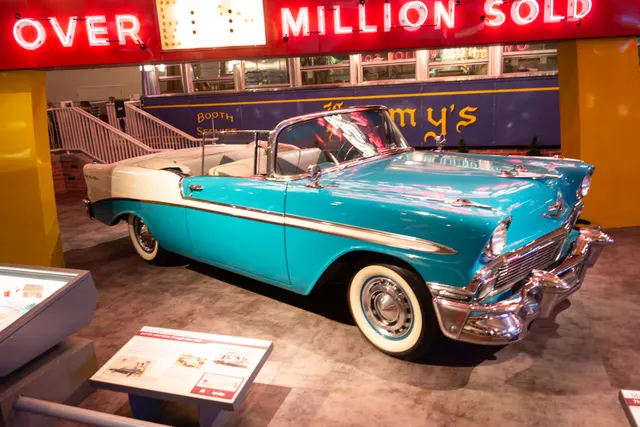 The Henry Ford's 1956 Bel Air convertible showing the five-passenger open body, windshield, top well, side trim, and museum-preserved exterior context.