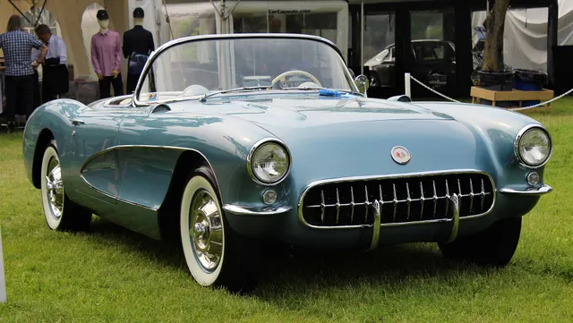Arctic Blue 1956 Corvette in front three-quarter view, retained as exact-year factory-color and exterior-form context.