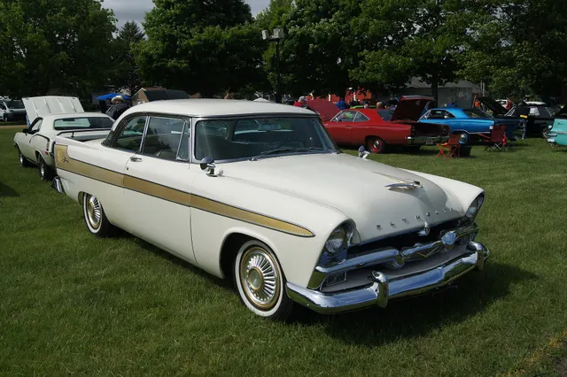 Exact-year stock-presenting view retained for body, trim, glazing, lamp, bumper, and wheel context; restoration details remain specific to the photographed car.