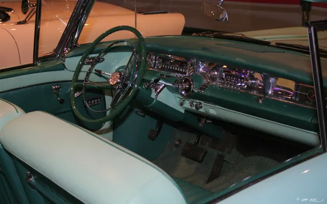 Exact-year restored Century convertible cabin retained for dashboard, controls, seating, upholstery, and trim context; finishes remain car-specific.
