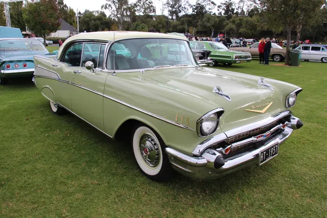 Four-door Sport Sedan showing the pillarless hardtop roof, four-door glazing, side trim, and six-passenger body.