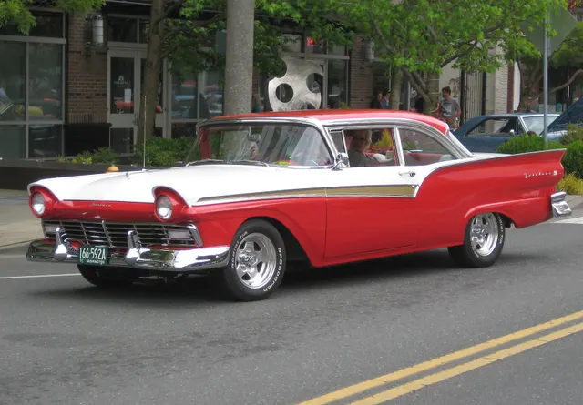 Exact-year view retained for body, trim, glass, lamps, bumpers, and wheel context; condition and restoration details remain specific to the photographed car.