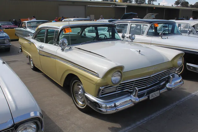 Exact-year view retained for body, trim, glass, lamps, bumpers, and wheel context; condition and restoration details remain specific to the photographed car.