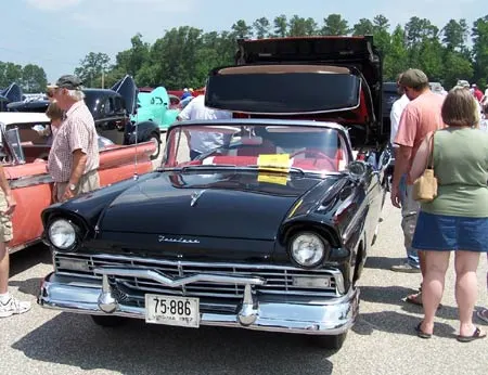Exact-year view retained for body, trim, glass, lamps, bumpers, and wheel context; condition and restoration details remain specific to the photographed car.