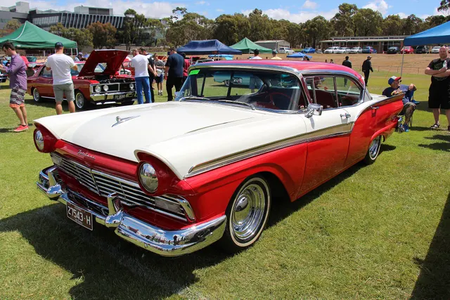 Exact-year view retained for body, trim, glass, lamps, bumpers, and wheel context; condition and restoration details remain specific to the photographed car.