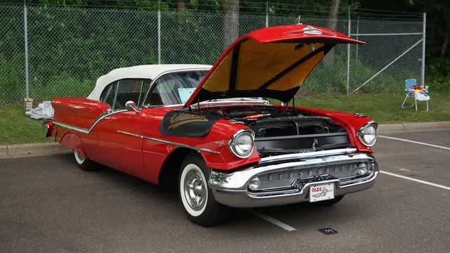Exact-year Super 88 convertible with its hood raised, retained for engine-bay layout, radiator support, hood structure, air-cleaner, firewall, and accessory context; individual components and restoration details require direct inspection.