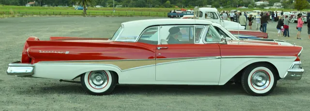 Exact-year view retained for body, trim, glass, lamps, bumpers, and wheel context; condition and restoration details remain specific to the photographed vehicle.