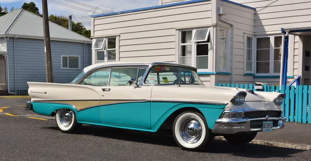 Exact-year view retained for body, trim, glass, lamps, bumpers, and wheel context; condition and restoration details remain specific to the photographed vehicle.