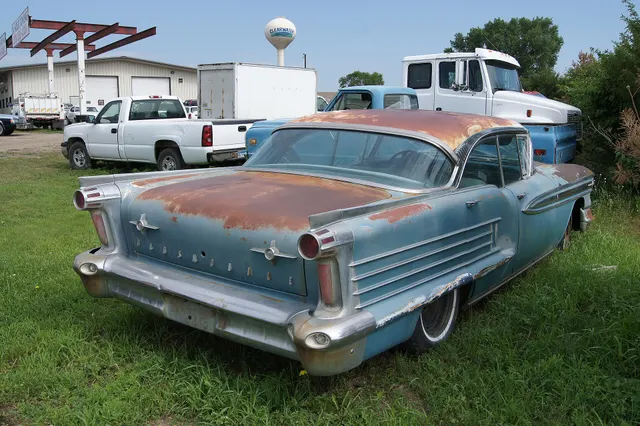 Rear preservation view retained for deck lettering, lamps, bumper, quarter moldings, roof, glass, and original-form body evidence.