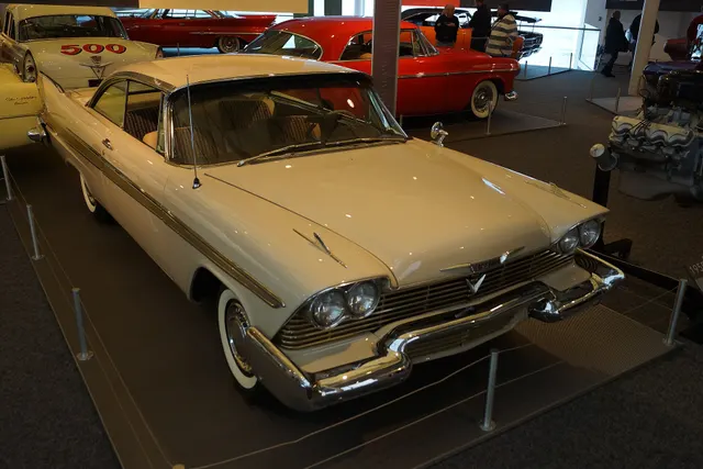 Exact-year stock-presenting view retained for body, trim, glazing, lamp, bumper, and wheel context; restoration details remain specific to the photographed car.