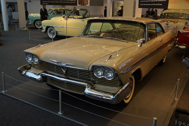 Exact-year stock-presenting view retained for body, trim, glazing, lamp, bumper, and wheel context; restoration details remain specific to the photographed car.