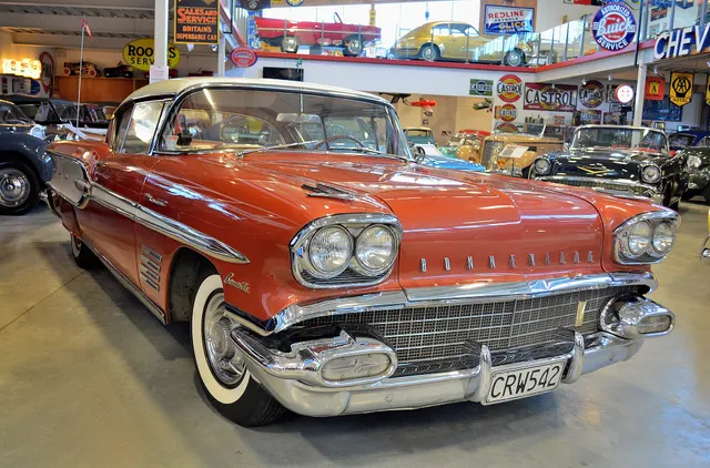 Exact-year stock-presenting view retained for body, trim, glazing, lamp, bumper, and wheel context; restoration details remain specific to the photographed car.