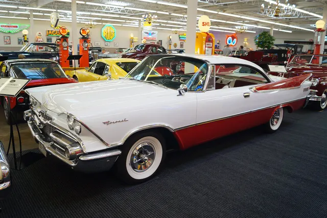 Exact-year Lancer hardtop retained for the front sheet metal, grille, lamps, roof, glass, side molding, wheel treatment, and two-tone layout; display setting and restoration remain car-specific.