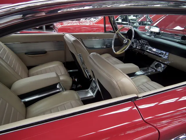 300F four-seat tan-leather cabin and full-length console