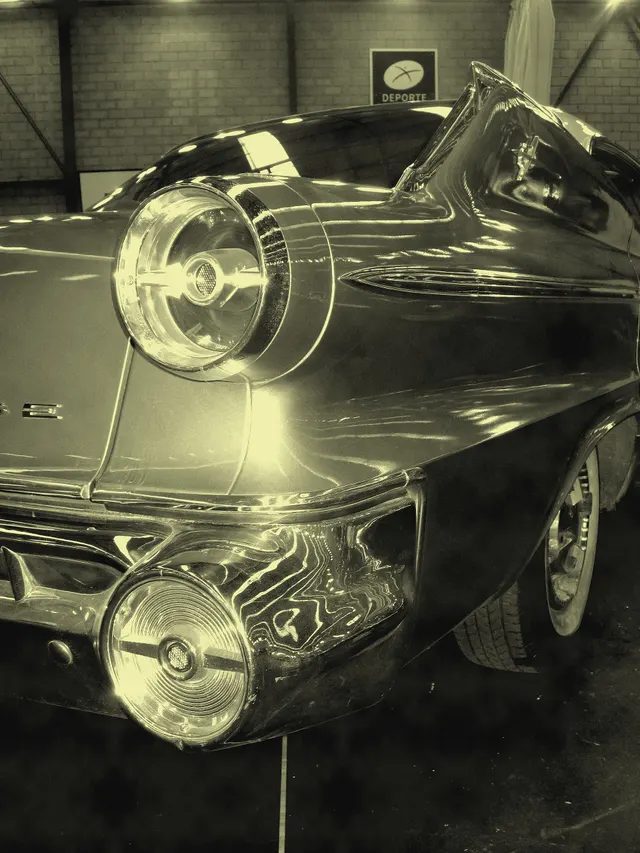 Exact-year view retained for body, trim, glass, lamps, bumpers, and wheel context; condition and restoration details remain specific to the photographed vehicle.
