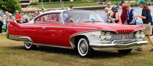 Exact-year Fury two-door hardtop retained for the pillarless roof, wraparound glass, front sheet metal, grille, lamps, Fury script, side trim, wheel treatment, and fixed-roof proportions.