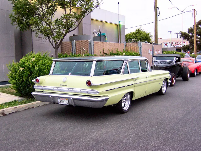 Exact-year stock-presenting view retained for body, trim, glass, lamp, bumper, and wheel context; condition and restoration details remain specific to the photographed car.