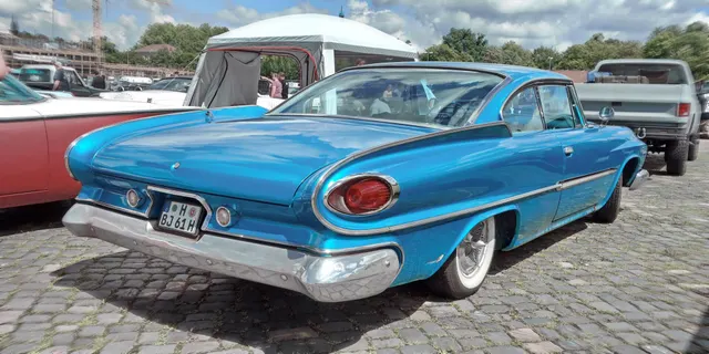 Exact-year view retained for body, trim, glass, lamps, bumpers, and wheel context; condition and restoration details remain specific to the photographed vehicle.