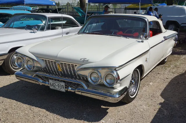 Exact-year view retained for body, trim, glass, lamps, bumpers, and wheel context; condition and restoration details remain specific to the photographed car.