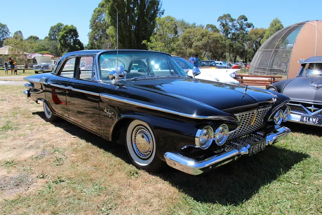 Exact-year view retained for body, trim, glass, lamps, bumpers, and wheel context; condition and restoration details remain specific to the photographed car.