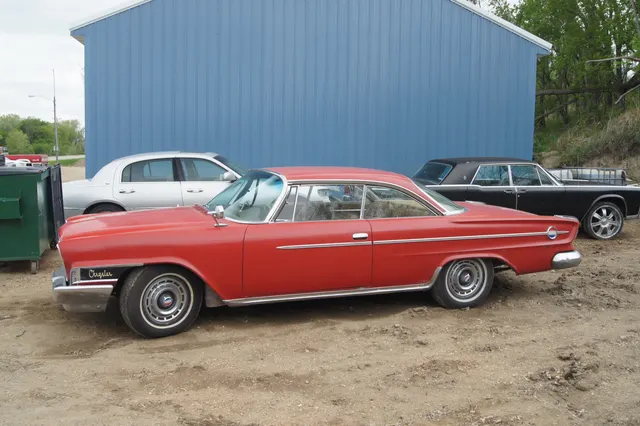 Exact-model hardtop profile showing the 122-inch-wheelbase proportions, pillarless glass, side trim, roof, wheels, and restrained rear quarters.