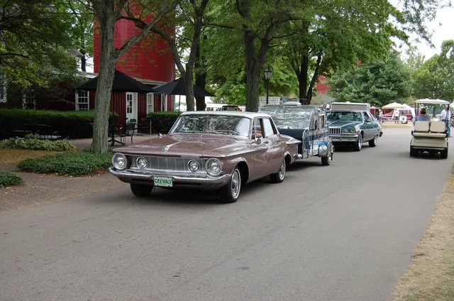 1962 Plymouth Savoy in road presentation, used to show the model-year body in motion rather than to claim package authenticity.