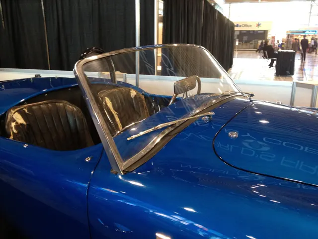 CSX2000 windscreen, cowl, mirror, seat, and cockpit trim. Condition and hardware are evidence for this chassis, not a universal trim standard.