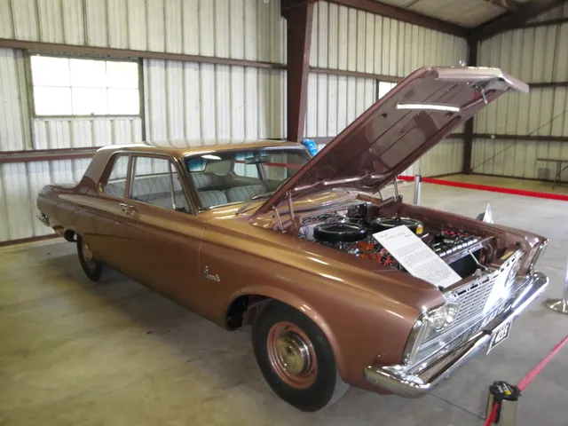 Documented 1963 Plymouth Savoy Super Stock 426 in restored stock presentation; the photographed display identifies VIN 3131129725.