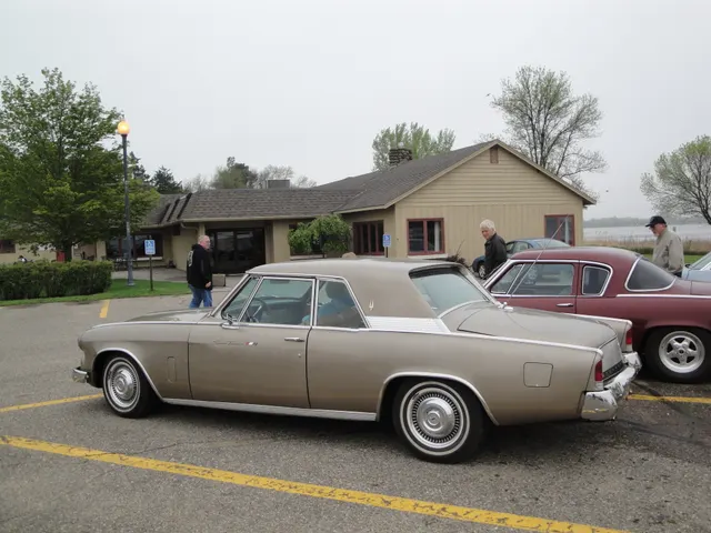 Side profile documenting the K6 hardtop roof, recessed rear glass, long hood, bright upper-body molding, door script, rear quarter, wheel covers, and 120.5-inch-wheelbase proportions.