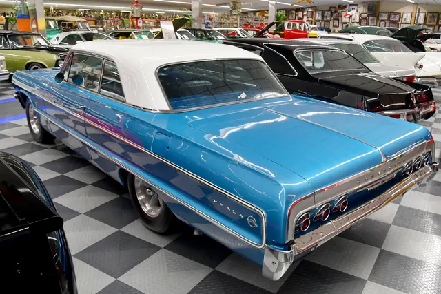 1964 Impala Super Sport rear panel, triple taillamps, and side trim