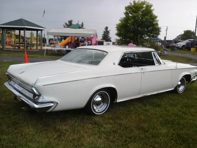 Rear three-quarter view of an exact-model hardtop showing the deck, lamps, bumper, roofline, and 300K identification.