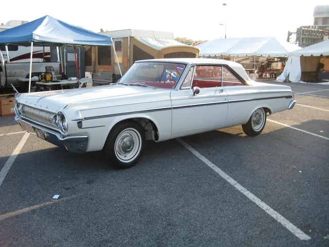 Exact-year stock-presenting Polara two-door front and side view retained for the hardtop profile, grille, lamps, body-side trim, steel wheels, hubcaps, bumpers, glass, and stance; the image is body context and does not authenticate Max Wedge equipment.