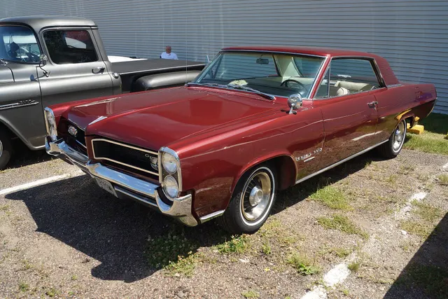 Exact-year stock-presenting view retained for body, trim, glass, lamps, bumpers, and wheel context; restoration details remain specific to the photographed car.