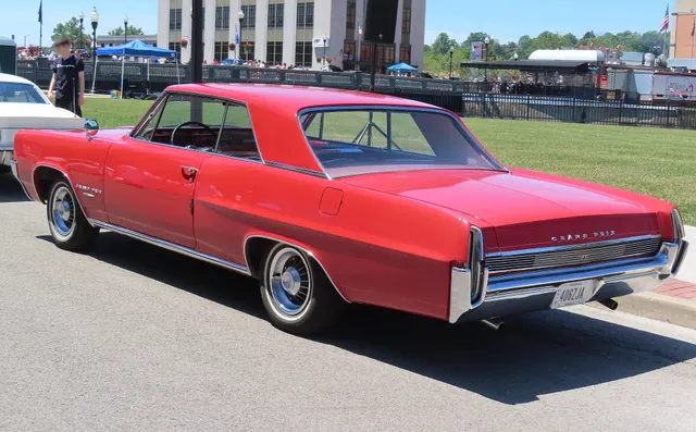 Exact-year stock-presenting view retained for body, trim, glass, lamps, bumpers, and wheel context; restoration details remain specific to the photographed car.