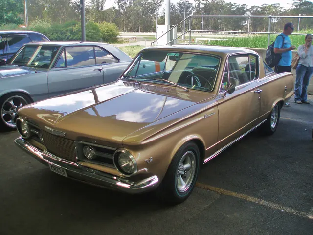Exact-year front three-quarter view retained for grille, lamps, hood, glass, and body context; the photographed car has nonstock wheels and restoration-specific details.