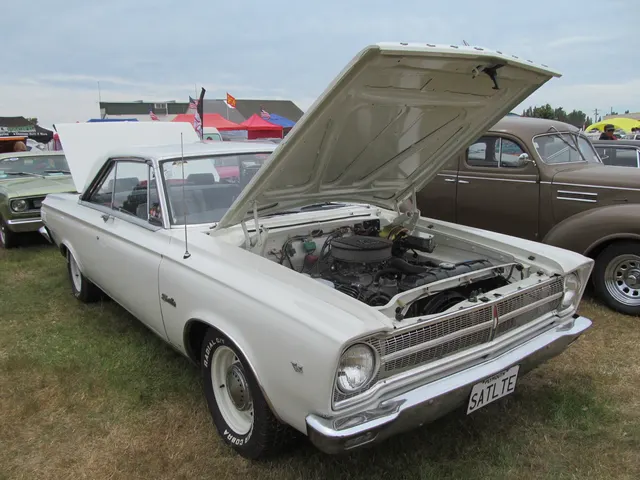 Modified 1965 Plymouth Satellite restoration with open hood