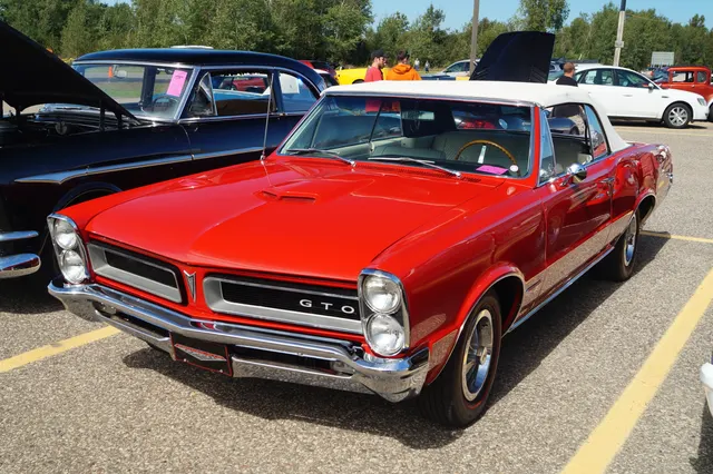 1965 Pontiac GTO convertible; used for convertible body-style context.