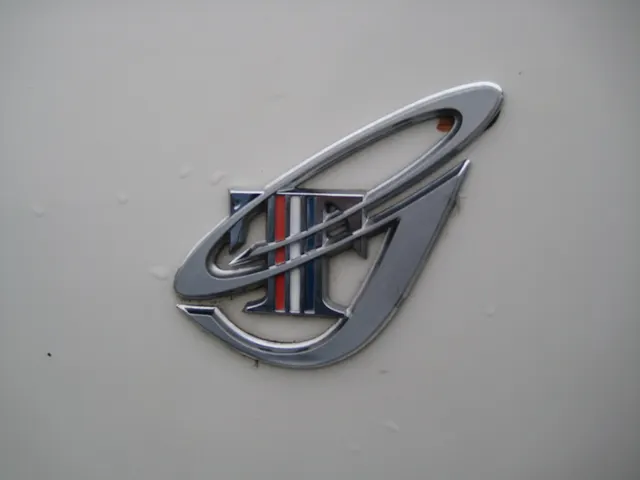 Exact-year GT quarter ornament detail retained for replaceable series-identification and mounting context; an ornament alone cannot authenticate a GT.