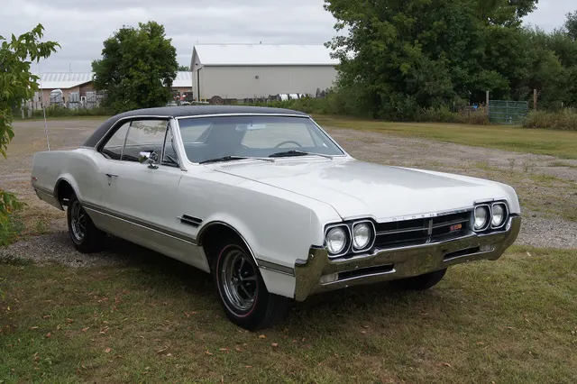 1966 Oldsmobile 4-4-2, front and passenger-side view