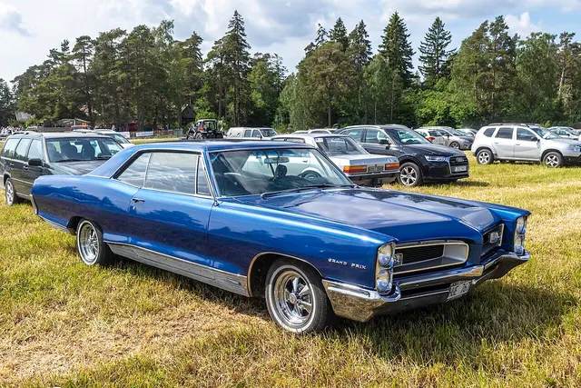 Blue 1966 Pontiac Grand Prix front view with non-stock wheels