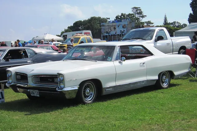 White 1966 Pontiac Grand Prix hardtop profile