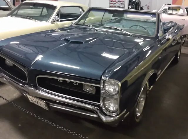 1966 Pontiac GTO convertible; used for convertible body-style context.