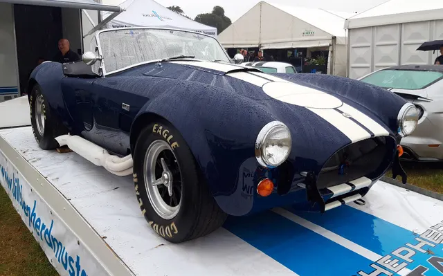CSX3315 in modern competition-event presentation. Decals, safety equipment, tires, and current race preparation do not establish delivered 1966 street equipment.